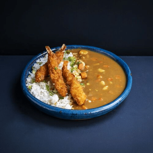 Curryreis mit Tempura-Garnelen