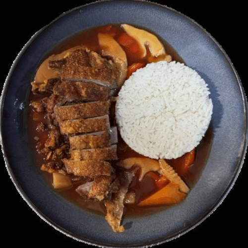 Gebackene Ente mit Süß-Sauer-Sauce und Ananas