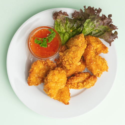 Chicken-Nuggets (8 Stück) mit einer Sauce nach Wahl