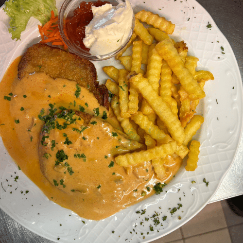 Panierter Schweinelachs mit Metaxasauce mit Pilz order ohne pilz