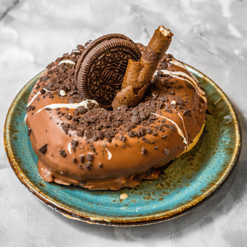 Premium Donut Oreo mit Vollmilch Schokoladen Glasur