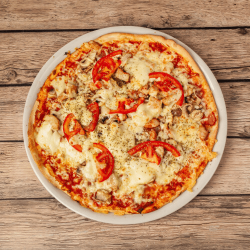 Pizza Prosciutto und Funghi