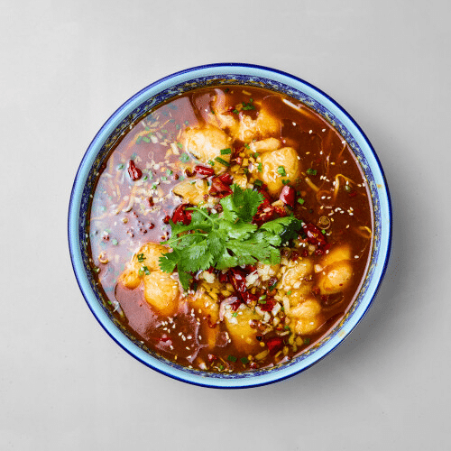 Zartgekochter Fisch in Szechuan Saucen (pikant)