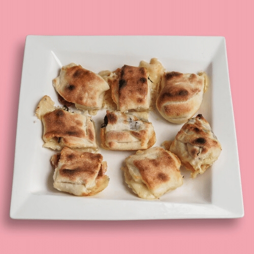 Pizzabrötchen mit Geflügel-Schinken und Gouda