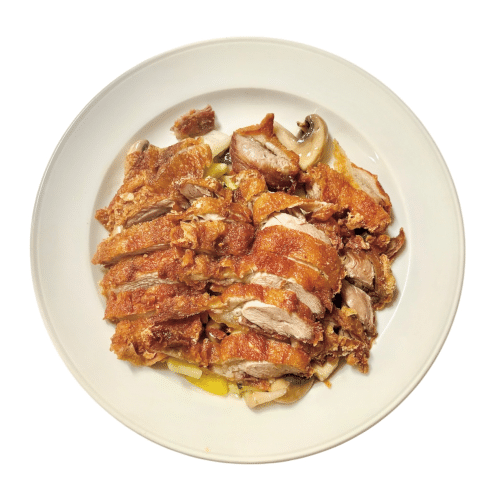 Gebackene Ente mit Gemüse und Knoblauchsauce (scharf)