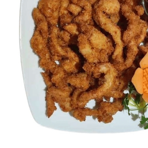 Panierte Hühnerfleischstreifen mit Erdnusssauce