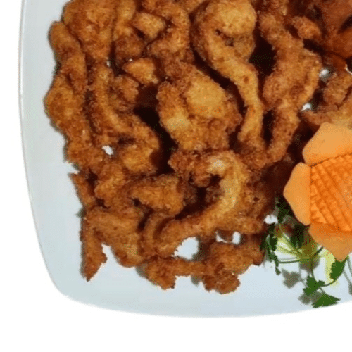 Panierte Hühnerfleischstreifen mit Süß-Sauer-Sauce