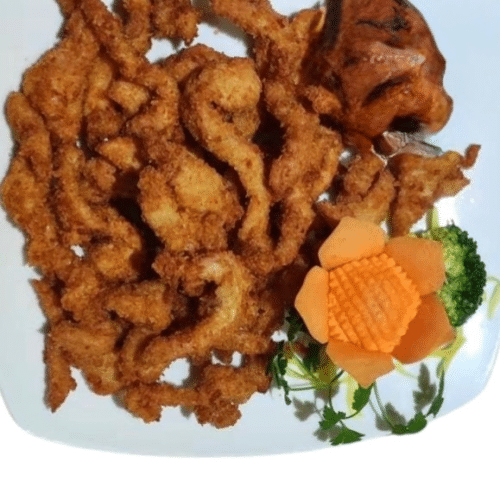 Panierte Hühnerfleischstreifen mit Süß-Sauer-Sauce