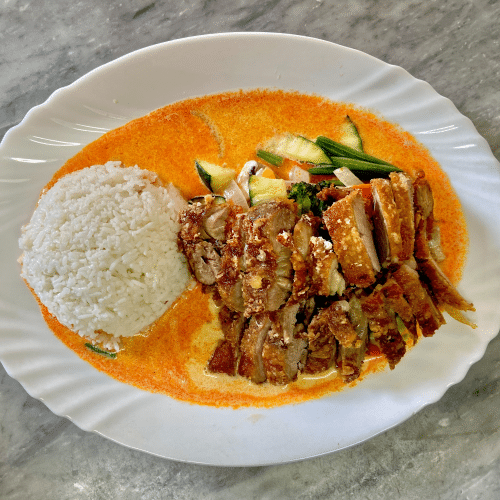 Hähnchenschenkel mit Gemüse & rotem Thai Curry (scharf)