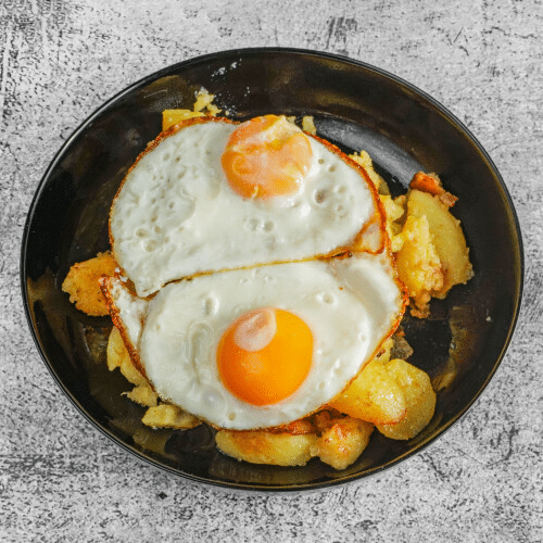 Bratkartoffeln mit Spiegeleiern