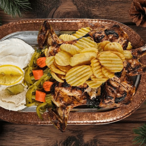 Hähnchen gegrillt auf Holzkohle (ganzes)