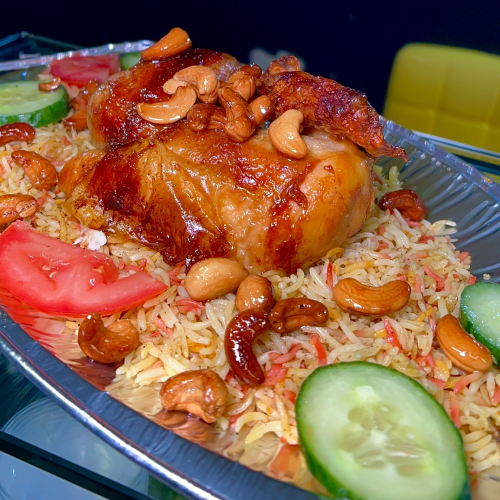 Mandi mit gegrilltes Hähnchen (Mansaf)