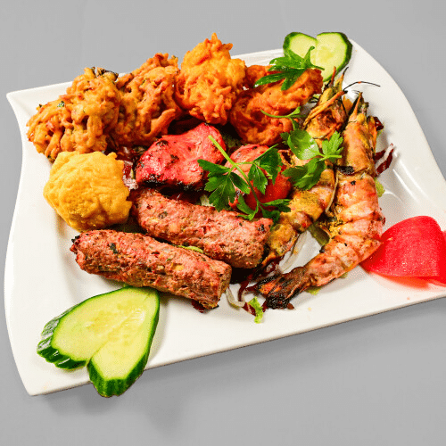 Fisch, Scampi, Fleisch und Gemüse - Vorspeisen-Teller (für zwei