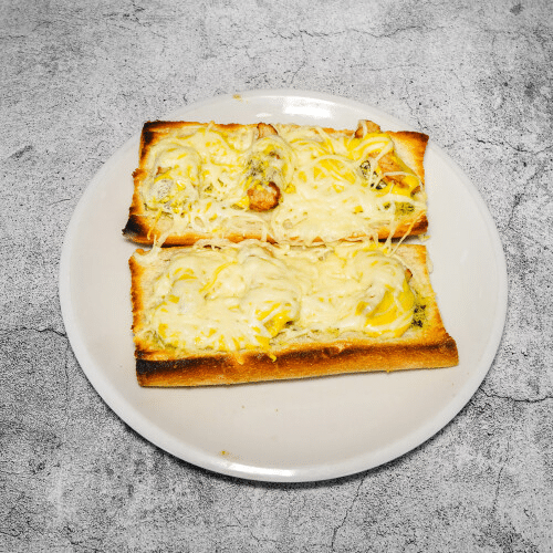 Baguette mit Hähnchen, Currysauce und Knoblauchbutter