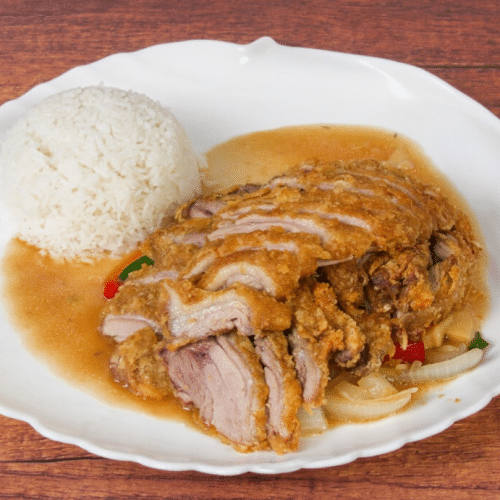 Gebackene Ente mit Bambussprossen, Zwiebeln, Karotten und Sauce