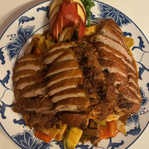 Knusprige Ente mit acht Kostbarkeiten,