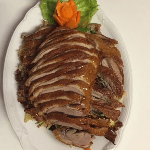 Knusprige Ente mit Pilzen (extra scharf),