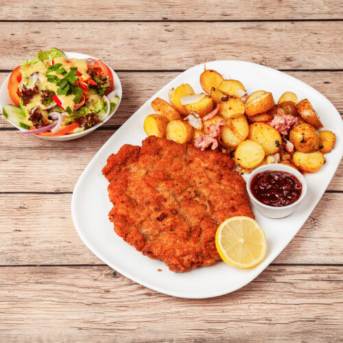 1 Wiener Schnitzel vom Kalb , Bratkartoffeln, Salat