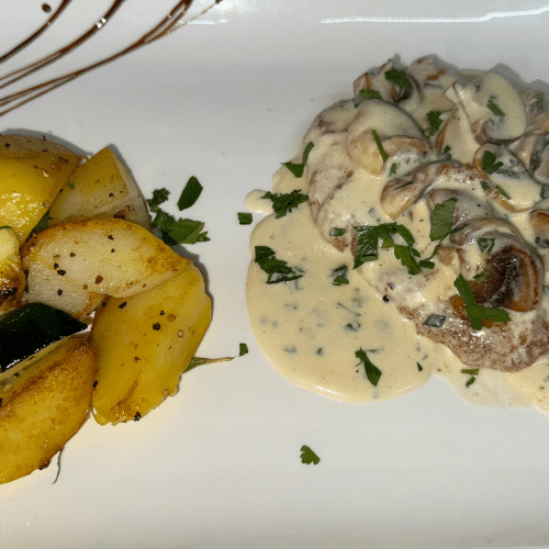 Schnitzel mit Champignon-Rahmsauce