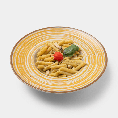 Penne mit Schwertfisch, Rucolapesto und Pinienkerne