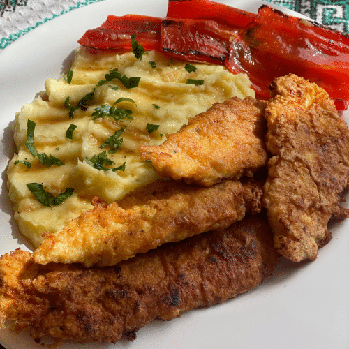 Knuspriges Hähnchen Schnitzel mit Kartoffelpüree