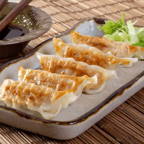 Gebackene Gyoza (4 Stück)