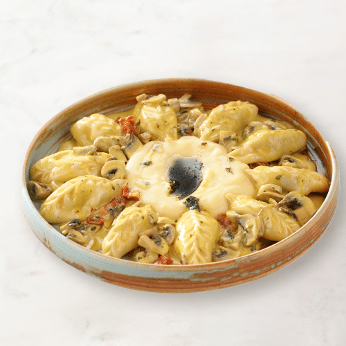 Khinkali mit Champignon Sahne-Sauce