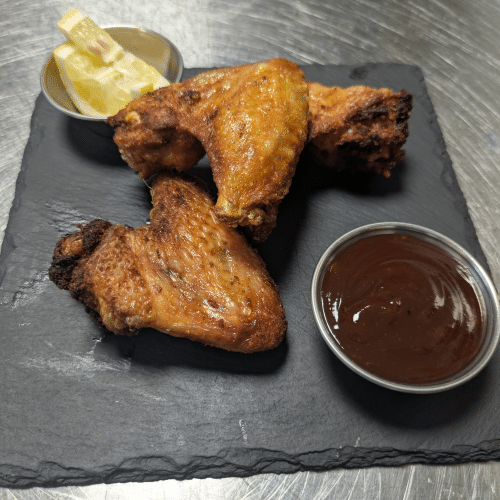 Alitas de pollo fritas