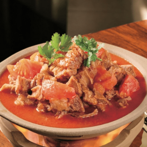 Geschmortes Rindfleisch mit Tomaten