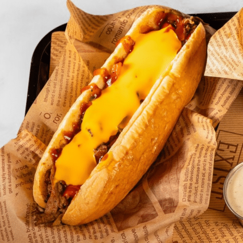 Philly Cheesesteak Sandwich & inkl. Tater Tots