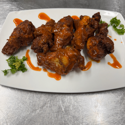 Buffalo Chikn Wings - Extra Hot mit Pommes frites (9 Stück)