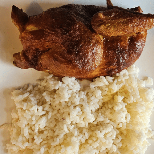 Halbes Hähnchen mit Reis,