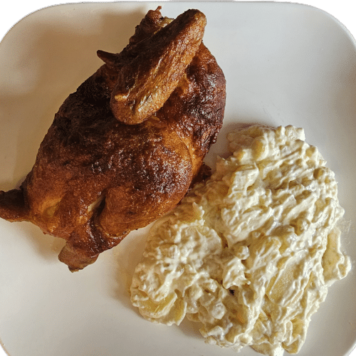 Halbes Hähnchen mit Salat,