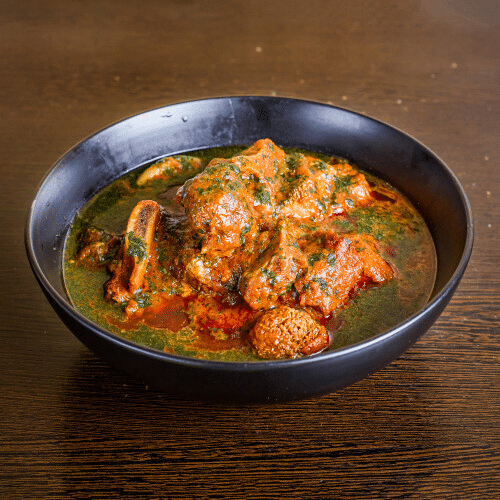 Tuo Zaafi mit Suppe, Eintopf und gemischtem Fleisch