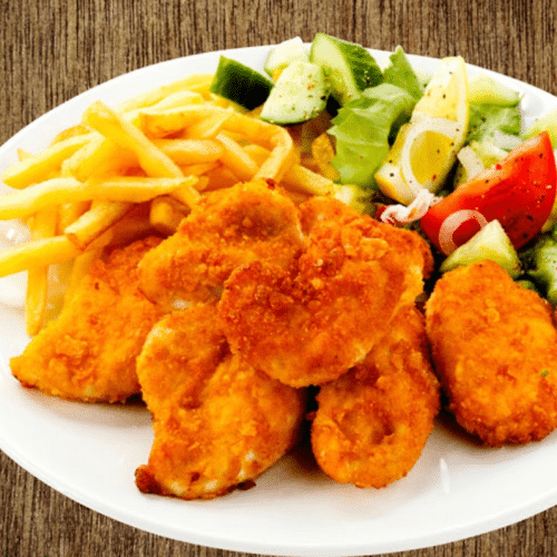 Nuggets Teller (6 St.) mit Salat & Pommes dazu Curry- oder BBQ Soße