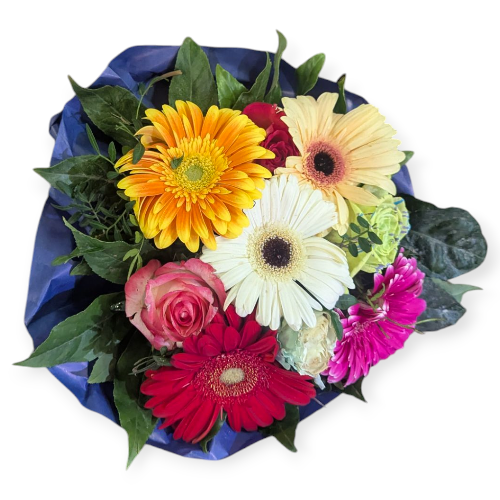 Ein verspielter Mix aus Gerbera und Rosen , frech, bunt und charmant