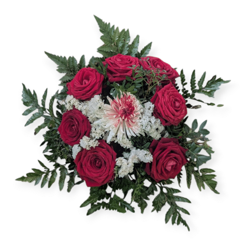 Rote Rosen mit einer zentralen Chrysantheme , majestätisch und würdevoll