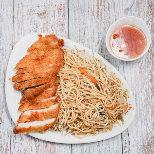 Gebackenes paniertes Hähnchenbrustfilet - Süß-Sauer-Soße