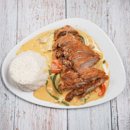 Knusprig gebackene Ente - Roter Currysoße