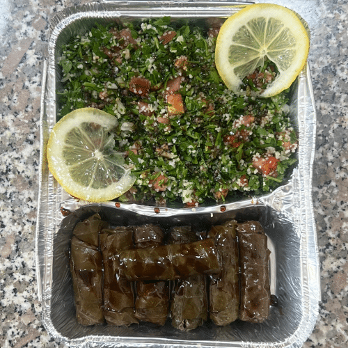 Waraq eanab mahshi yalanji mit Taboulé und Granatapfelmelasse
