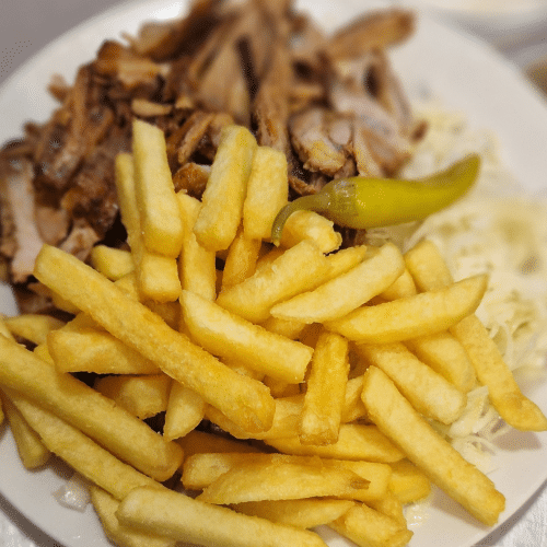 Gyros mit Krautsalat und einer Beilage nach Wahl