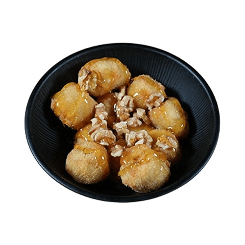 Gebackene Banane mit Honig und Walnüssen