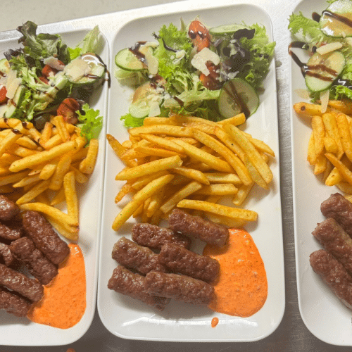 6 Cevapcici mit Djuvecreis oder Pommes