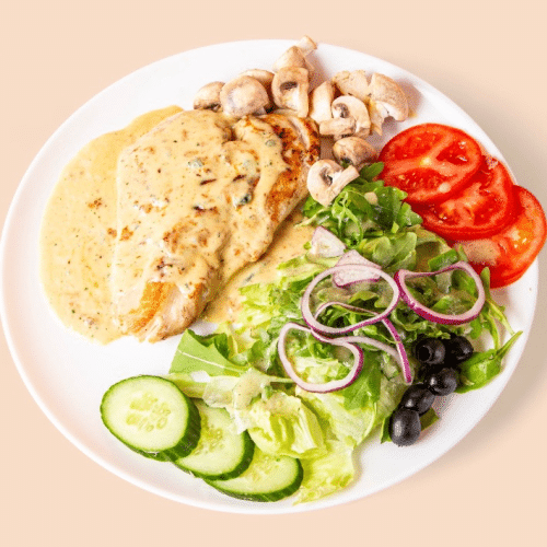 Hähnchenbrustfilet mit frischen Champions Und Beilage nach Wahl