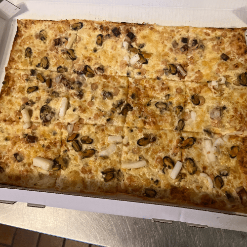 Pizza Meeresfrüchte und Knoblauch