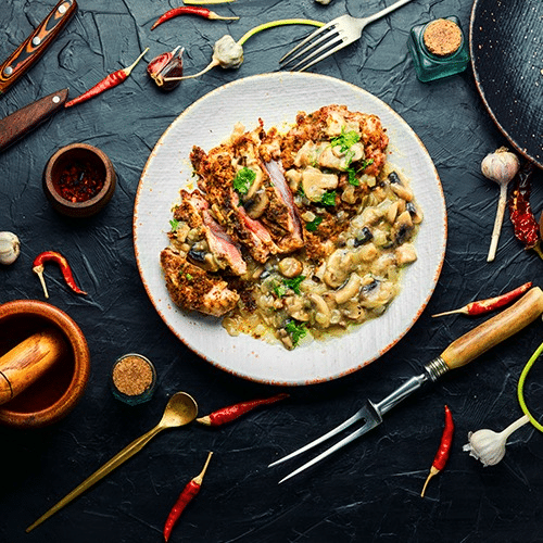 Hähnchenschnitzel mit Hackfleischsauce (extra überbacken)