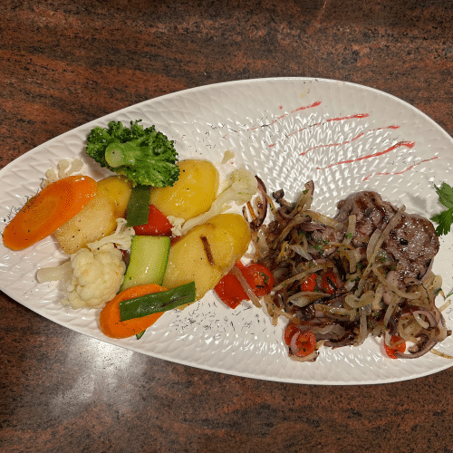 Bistecca con cipolle