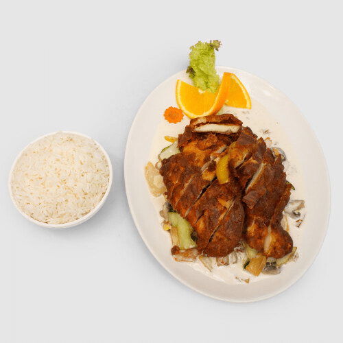 Gebackenes Hühnerfleisch in Kokosmilch