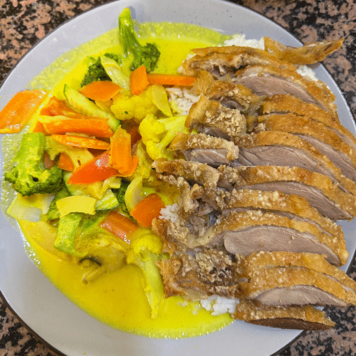 Ente kross gelbe Currysauce