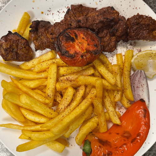 Gegrillte Ente mit Pommes